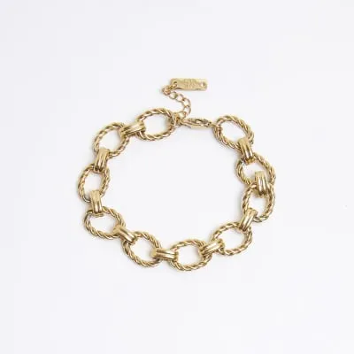 Gold Steel Link Bracelet sold by River Island