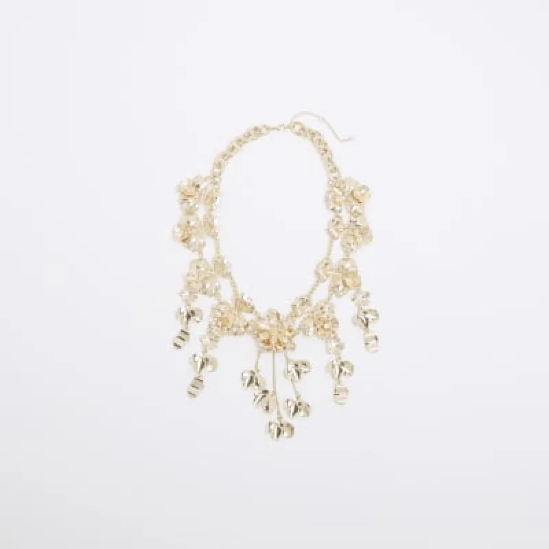 Gold Flower Collar Necklace sold by River Island