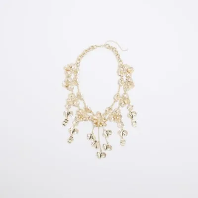 Gold Flower Collar Necklace sold by River Island