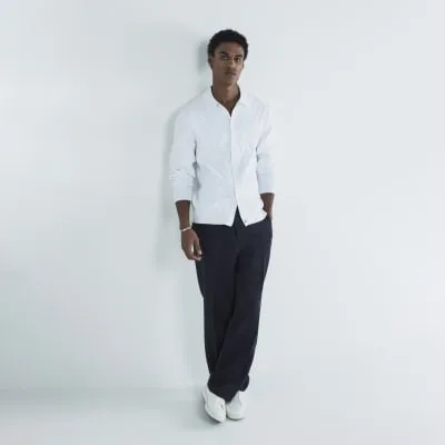 White Slim Fit Chevron Knitted Polo Shirt sold by River Island