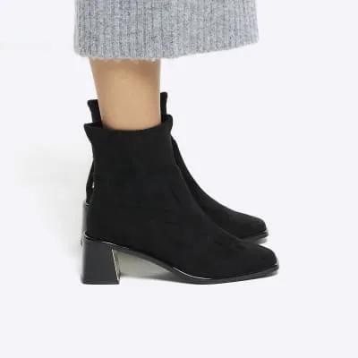 Black wide fit block heel ankle boots sold by River Island