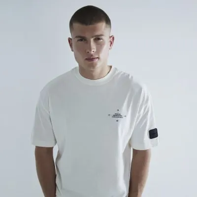 Ecru Patch Short Sleeve Graphic T-Shirt sold by River Island