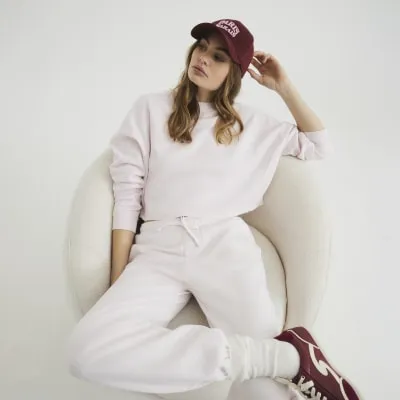 Pink Washed Cuffed Joggers sold by River Island