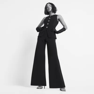 Black Longline Waistcoat Jumpsuit sold by River Island