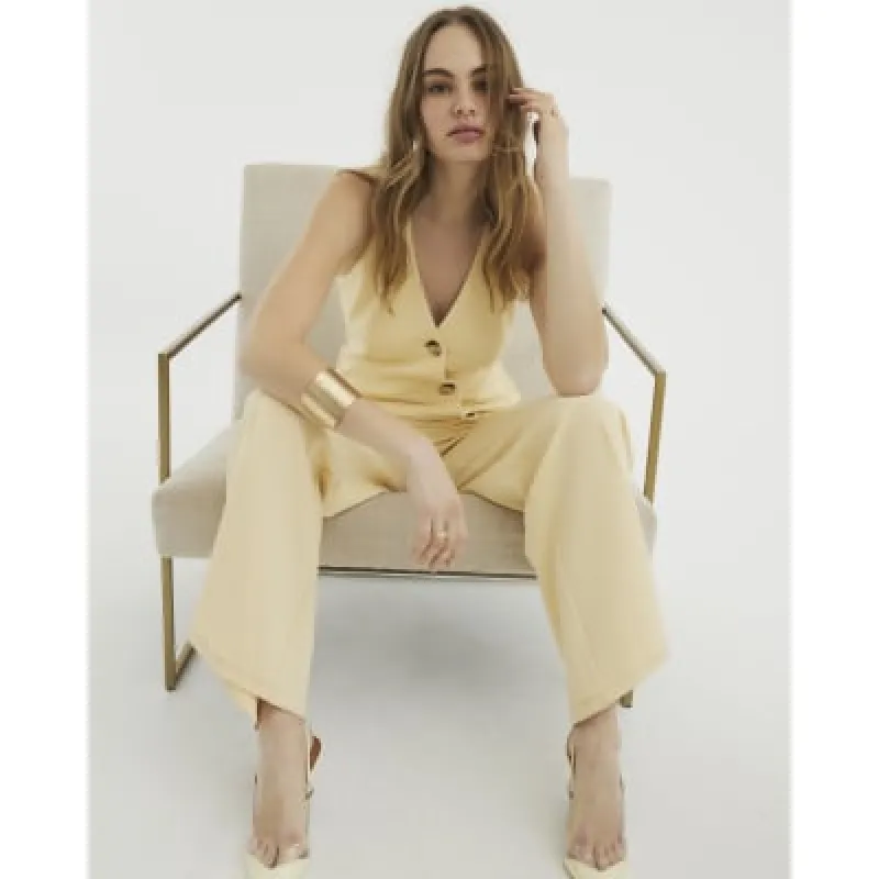 Yellow Sleeveless Asymmetric Jumpsuit sold by River Island