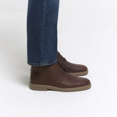 Brown Leather lace up chukka boots sold by River Island