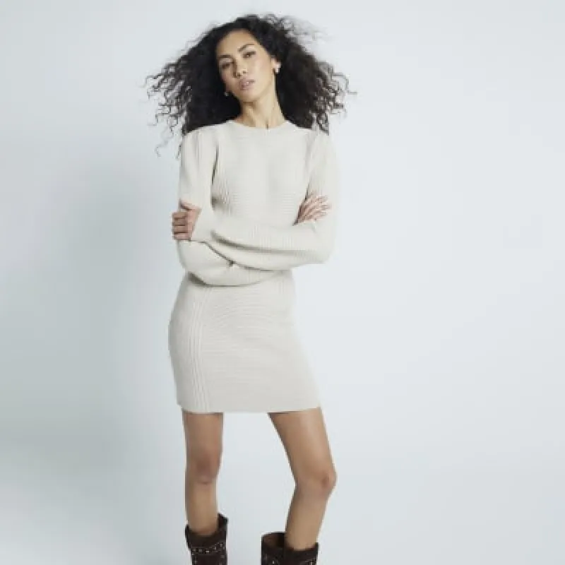 Cream Crew Neck Ribbed Mini Jumper Dress sold by River Island