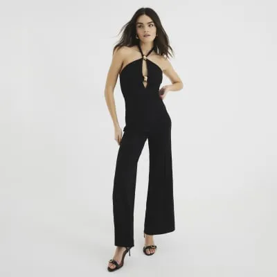 Black Halter Neck Trim Jumpsuit sold by River Island