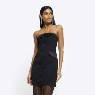Black tux bandeau mini dress sold by River Island