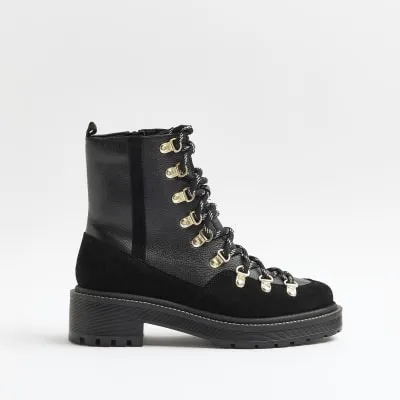 Black suede lace up hiker boots sold by River Island