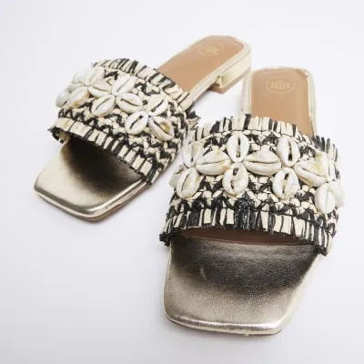 Beige raffia strap mule sandals sold by River Island