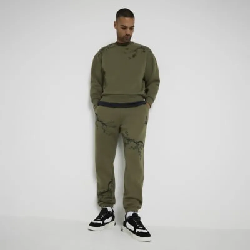 Khaki Regular Fit Floral Print Joggers made by River Island