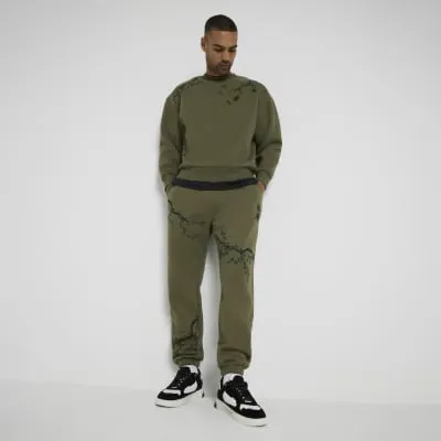 Khaki Regular Fit Floral Print Joggers sold by River Island