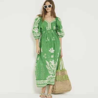 Green floral puff sleeve swing maxi dress sold by River Island