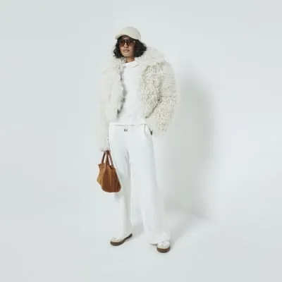 Cream Cosy Long Sleeve High Neck Top sold by River Island