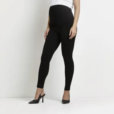 Black high waisted ponte maternity leggings sold by River Island
