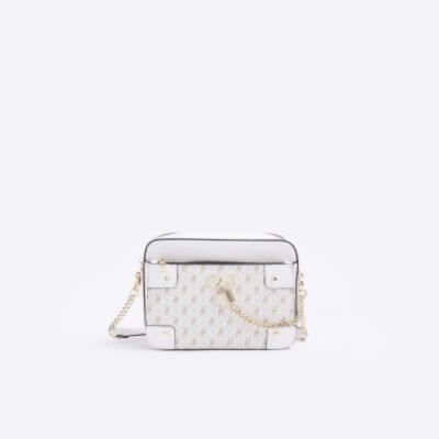 White RI monogram padlock cross body bag sold by River Island