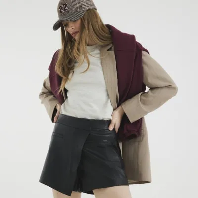 Black Faux Leather Wrap Skort sold by River Island