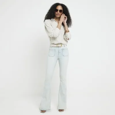Blue high waisted pocket flared jeans sold by River Island