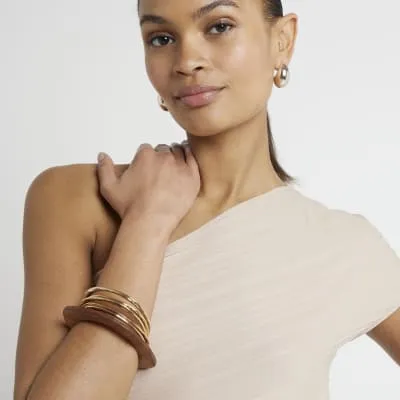 Beige Plisse Off Shoulder Top sold by River Island