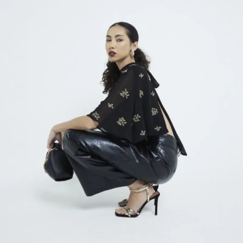 Black Embellished Cape sold by River Island