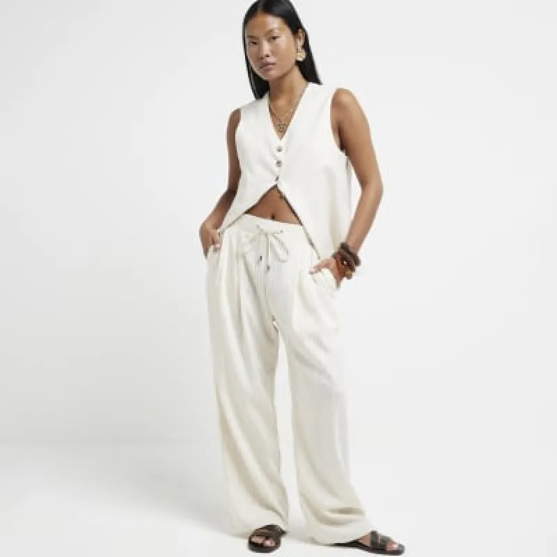 Petite Cream Wide Leg Stripe Trousers sold by River Island