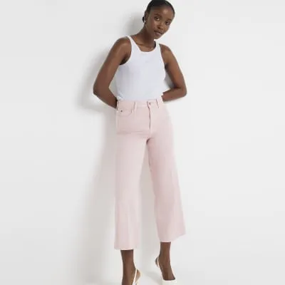 Pink high waisted wide leg cropped jeans sold by River Island