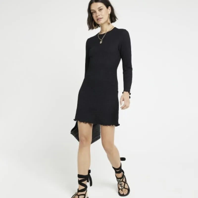 Black textured shift mini dress sold by River Island