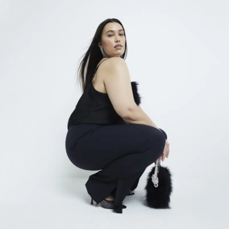 Plus Black Slim Fit Tailored Flared Trousers sold by River Island