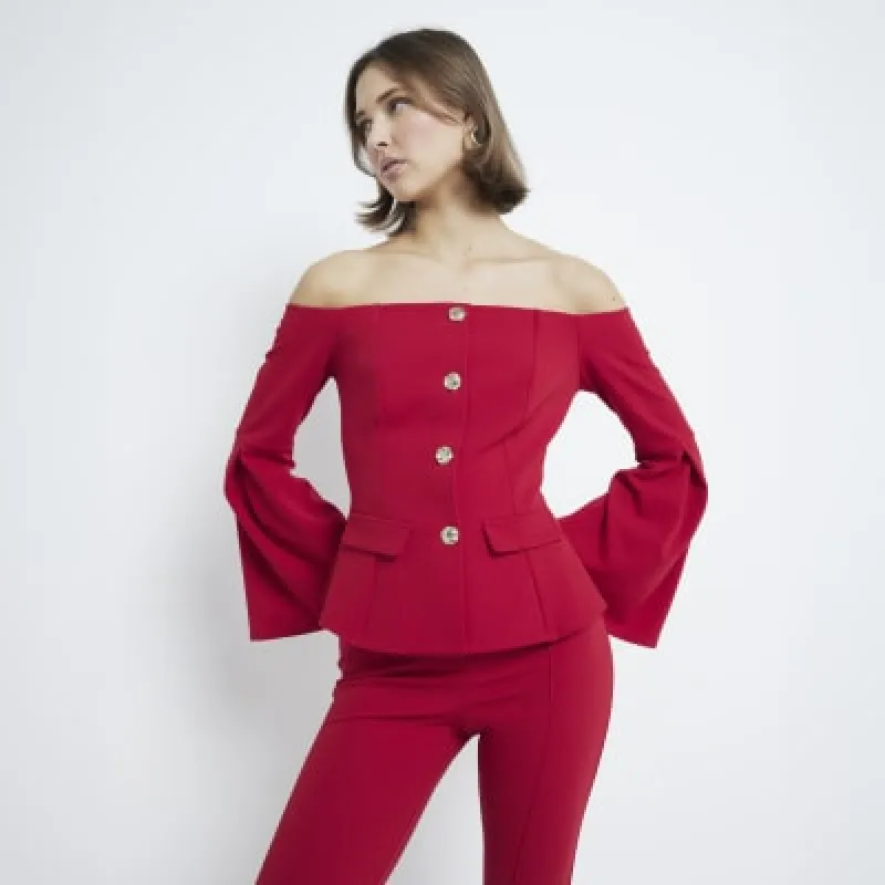 Red scuba bardot off the shoulder jacket sold by River Island
