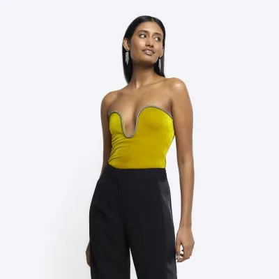 Yellow diamante wire bandeau top sold by River Island