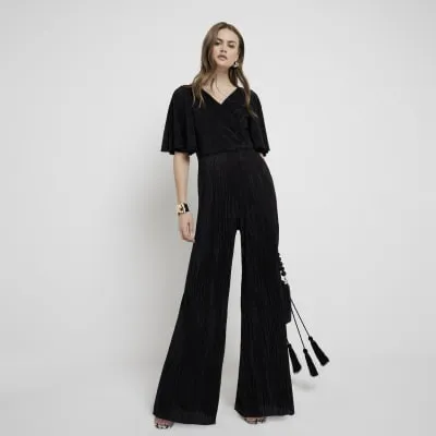 Black plisse wrap jumpsuit sold by River Island