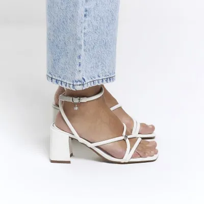 White wide fit strappy heeled sandals sold by River Island