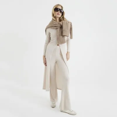 Cream Wide Leg Trousers sold by River Island