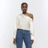 Beige satin off shoulder top sold by River Island