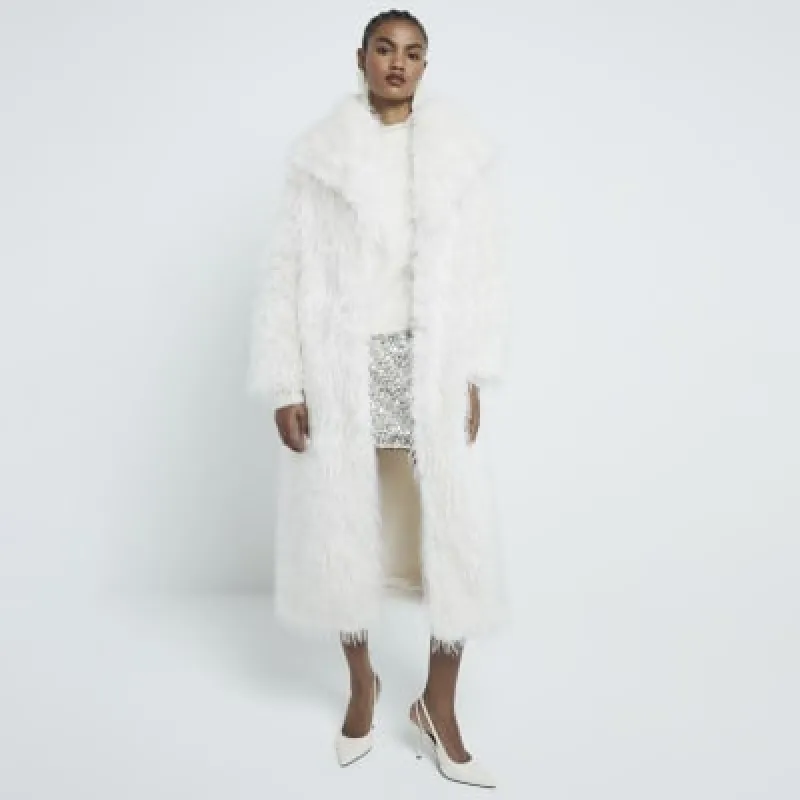 Cream Maxi Shaggy Faux Fur Coat sold by River Island