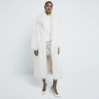 Cream Maxi Shaggy Faux Fur Coat sold by River Island