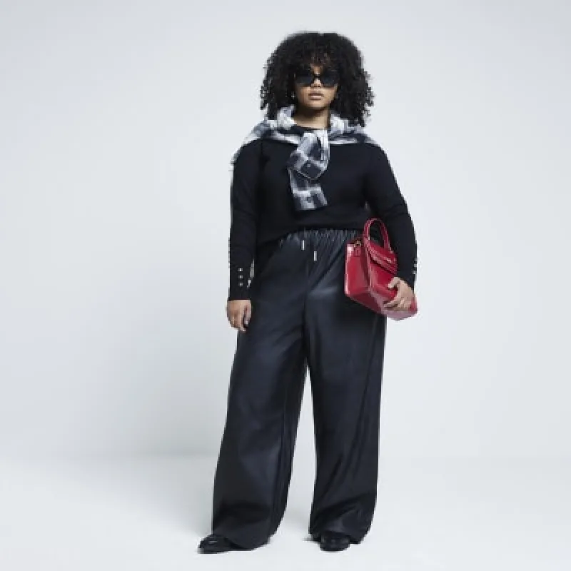 Plus Black fine knit long sleeve top sold by River Island