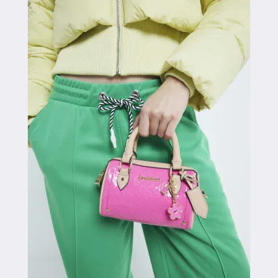 Pink Mini Embossed Monogram Cross Body Bag sold by River Island