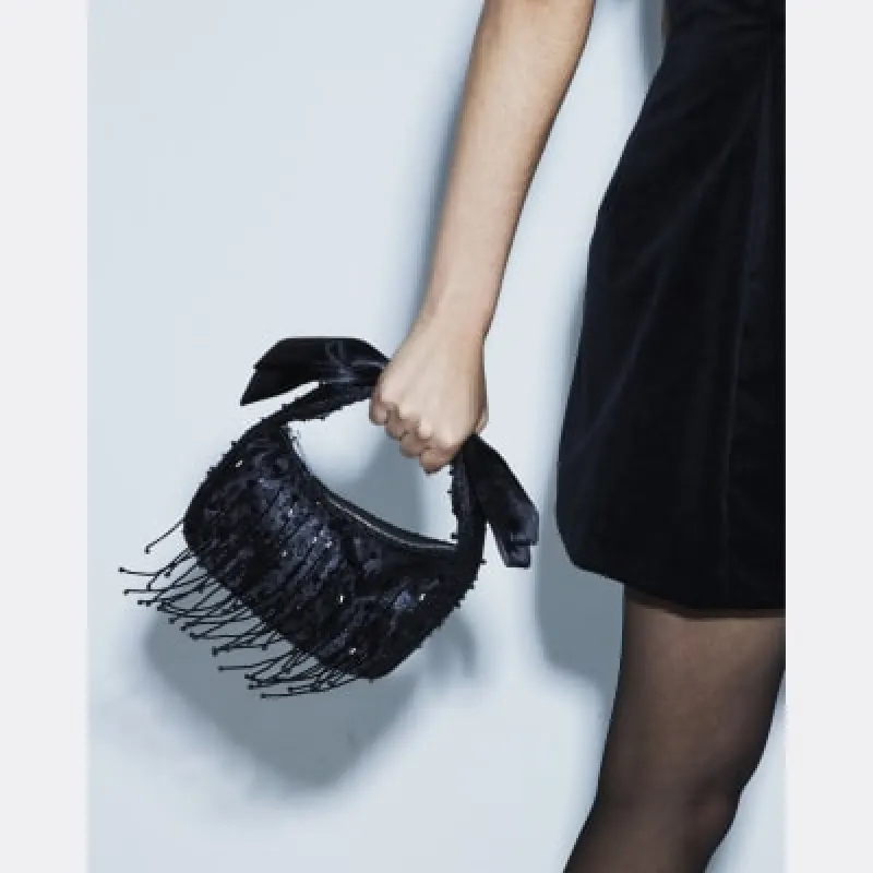 Black Beaded Bow Handle Clutch Bag sold by River Island