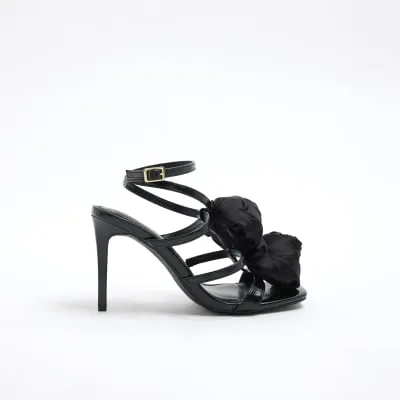 Black Flower Corsage Strappy Heeled Sandals sold by River Island