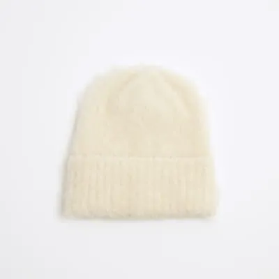 Yellow Fluffy Beanie sold by River Island