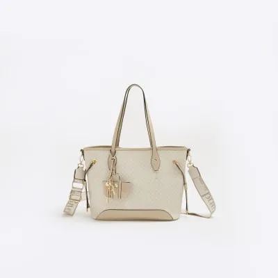 Beige Monogram Side Tie Charm Shopper Bag sold by River Island