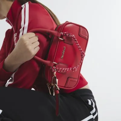 Red Faux Leather Charm Top Handle Bowler Bag sold by River Island