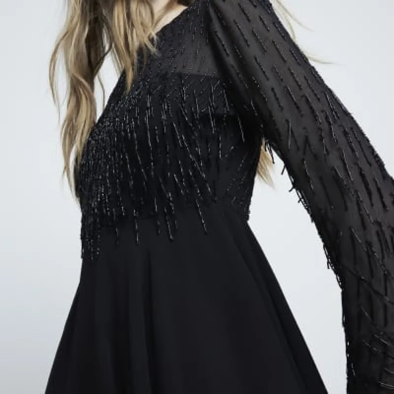 Black Premium Embellished Fringed Mini Dress sold by River Island
