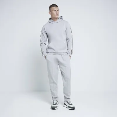Stone Regular Fit Interlock Taped Hoodie sold by River Island