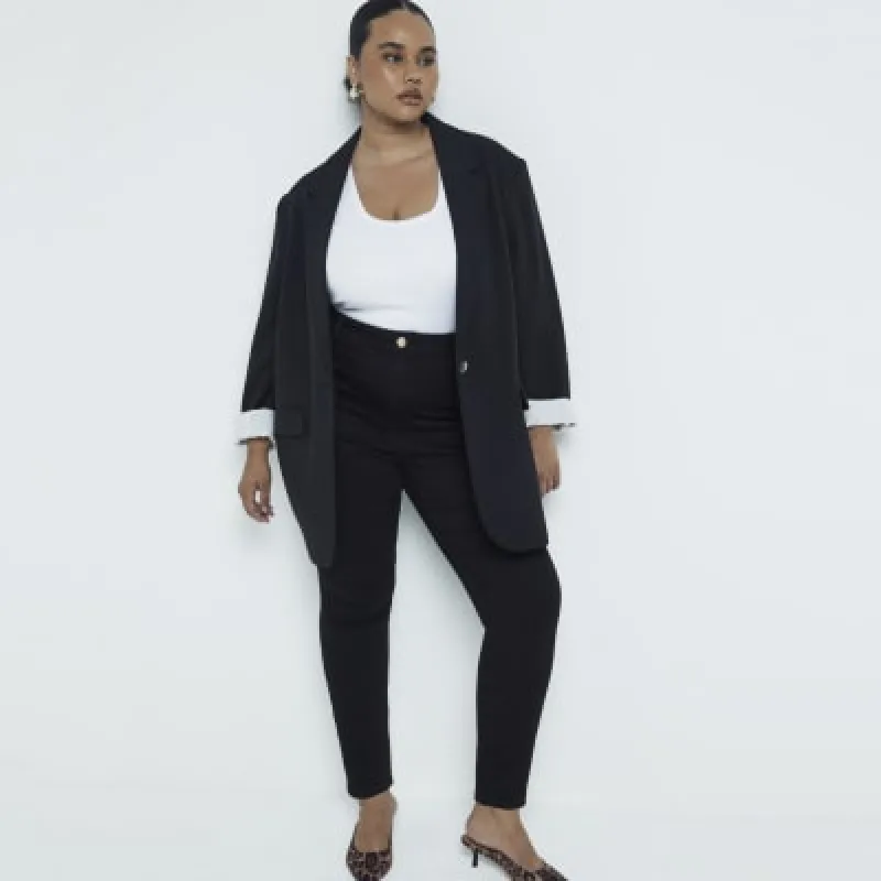 Plus black high waisted skinny jeans sold by River Island