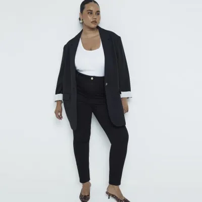 Plus black high waisted skinny jeans sold by River Island