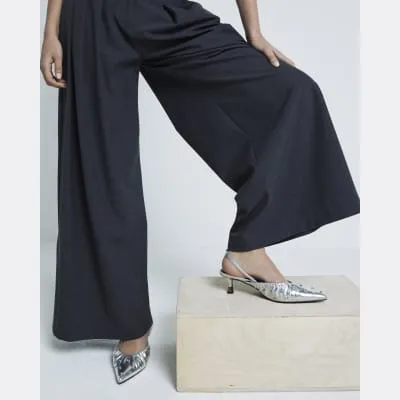 Silver Sling Back Court Stud Shoes sold by River Island