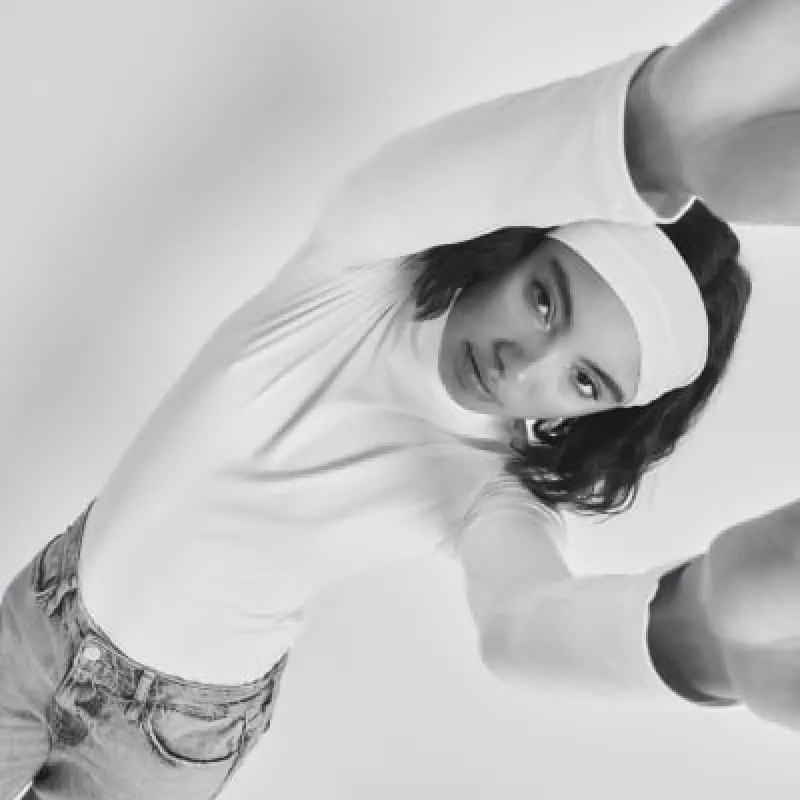 Cream Long Sleeve High Neck Top sold by River Island